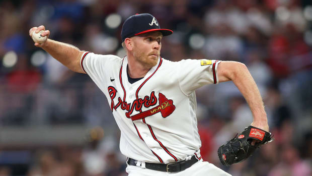 Jun 15, 2023; Atlanta, Georgia, USA; Atlanta Braves relief pitcher Michael Tonkin (51) throws against the Colorado Rockies in the sixth inning at Truist Park.